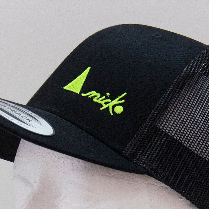 THE TRUCKER CAP WITH NEON YELLOW LOGO - SNAPBACK